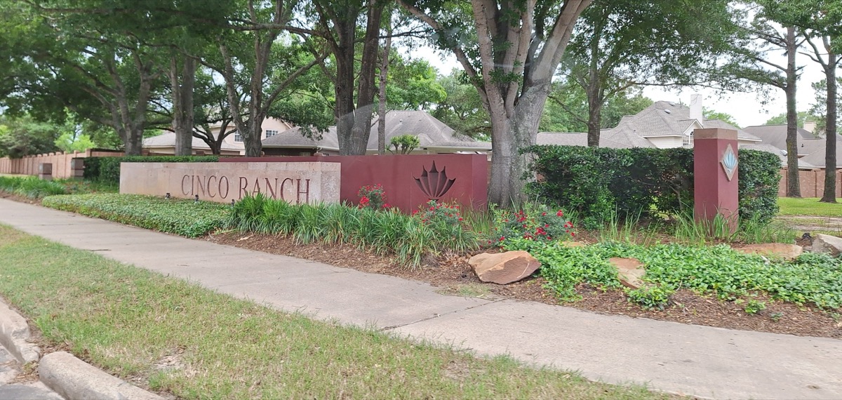 Cinco Ranch community entrance sign in Katy, Texas